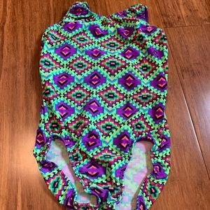 green and purple designed leo